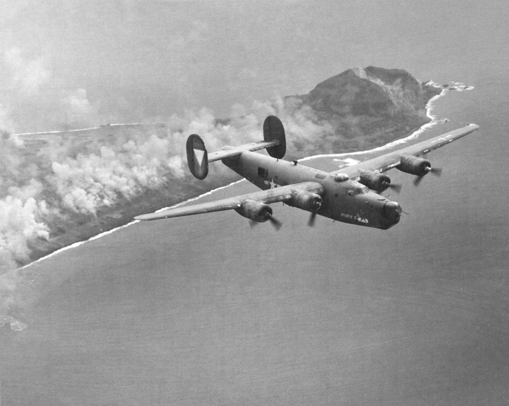 : Consolidated B-24J Liberator ''Deadeye II'' of the 392nd Bomb Squadron flown by Lt. Warren Myllenbeck flying from Saipan, Mariana Islands, overflying Iwo Jima and Mt Suribachi, 1944-45.