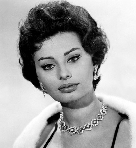 : Sofia Villani Scicolone, Dame of the Grand Cross, OMRI (Italian: [so'fia vil'lani iko'lone]; born 20 September 1934), known professionally as Sophia Loren (Italian: ['lren], English: /l'rn/)    circa. 1958