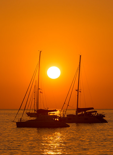 Sunset yacht's silhouette at Nai Harn beach, Phuket island, Thailand ©  Phuket@photographer.net