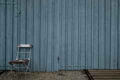 chair and blue wall