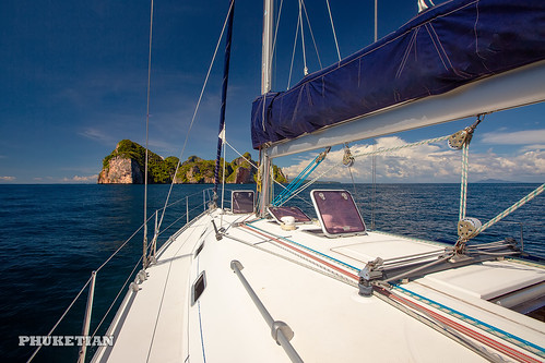 Sailing yacht near Phi Phi islands in our trip from Thailand to Malaysia. Islands, sails, blue water, and full relax        XOKA8333bs ©  Phuket@photographer.net