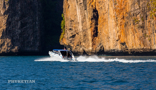 Sailing yacht near Phi Phi islands in our trip from Thailand to Malaysia. Islands, sails, blue water, and full relax        XOKA8472bs ©  Phuket@photographer.net