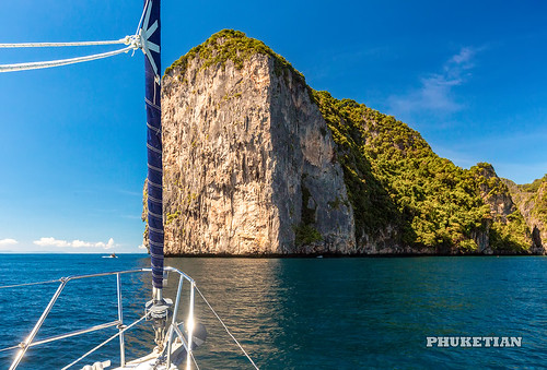 Sailing yacht near Phi Phi islands in our trip from Thailand to Malaysia. Islands, sails, blue water, and full relax        XOKA8352bs ©  Phuketian.S