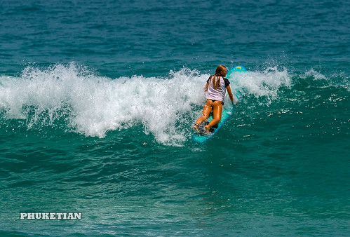 Girl in thongs on the surf on the waves    XOKA5744bs3 ©  Phuket@photographer.net