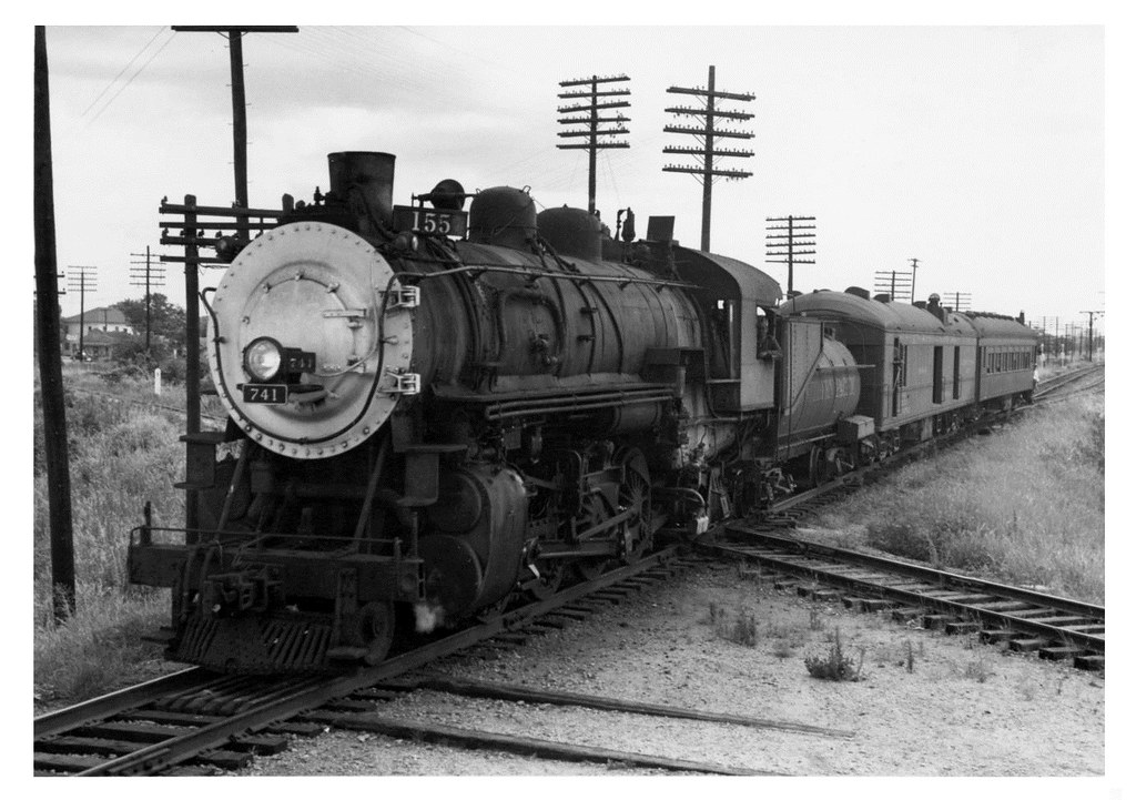 : [Southern Pacific train passing through Dallas]
