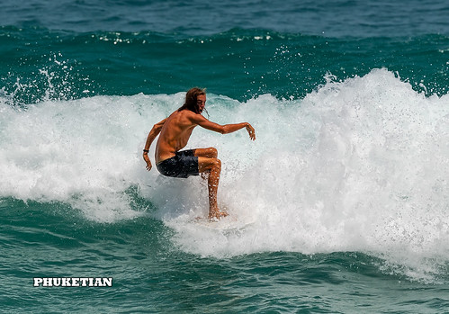 Fall of the athlete from the surf on the wave. Nai Harn beach, Phuket, Thailand    XOKA5769b3s ©  Phuket@photographer.net