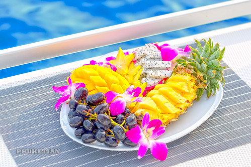 Fruit plate with pineapple, mango, grapes and dragon fruit (pitaya or pitahaya) on the sailing yacht in Thailand between Phuket and Phi Phi island     XOKA3510b4s ©  Phuket@photographer.net