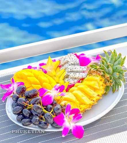 Fruit plate with pineapple, mango, grapes and dragon fruit (pitaya or pitahaya) on the sailing yacht in Thailand between Phuket and Phi Phi island    XOKA3510b5s ©  Phuket@photographer.net