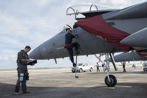 Pilot, goes over a pre-flight checklist. ©  Robert Sullivan