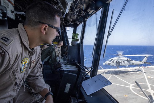 Lt. Andrew Poulin observes an Sikorsky SH-60/MH-60 Seahawk (or Sea Hawk) helicopter. ©  Robert Sullivan