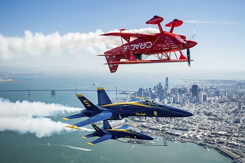 In advance of Fleet Week performances, 'Team Oracle' aerobatics pilot Sean D. Tucker and U.S. Navy 'Blue Angels' fly over the San Francisco Bay during a photo flight on Thursday, Oct. 5, 2017 ©  Robert Sullivan