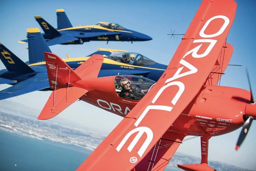 In advance of Fleet Week performances, the U.S. Navy 'Blue Angels' and 'Team Oracle' aerobatics pilot Sean D. Tucker fly over the San Francisco Bay during a photo flight on Thursday, Oct. 6, 2017. ©  Robert Sullivan