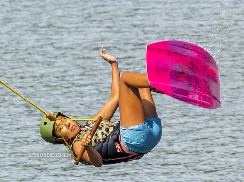 Girl on a wakeboard in flight from a springboard   XOKA6532ss ©  Phuket@photographer.net