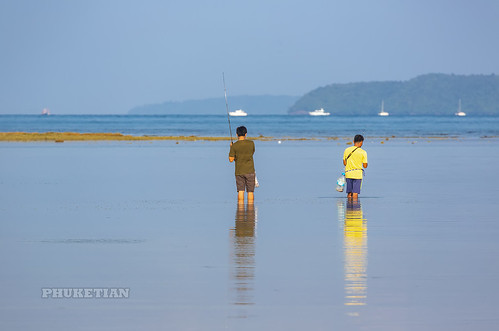 Fishermen and people collecting shells and crabs at low tide. Rawai Beach, Phuket, Thailand. 09/27/201 ©  Phuket@photographer.net