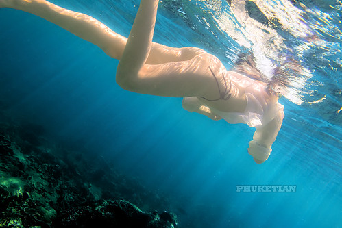 Underwater photo. Young slim girl in micro bikini over coral reef           IMG_0440b2s ©  Phuket@photographer.net