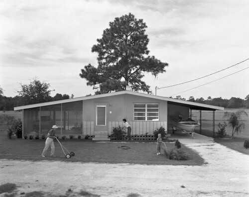 Yardwork at the Vaught family residence in Belleview ©  Florida Memory