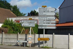 Direction signage at the crossroads of the D26 and D928 (former N28), Lederzeele, Hauts-de-France.