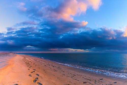 Evening. Footprints in the sea sand (Seascape) ©  Alexey Fedenkov