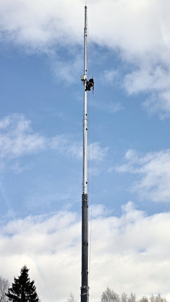 : DP2Q3621. Steeplejack Equipping a Communications Mast near Village Podzhigorodovo ()