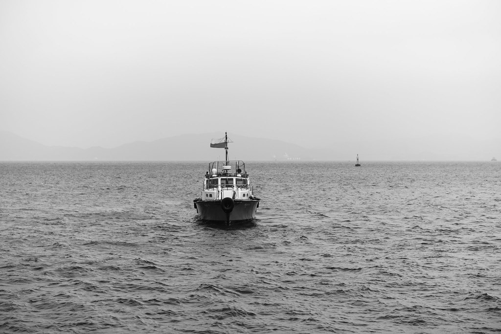 : lonely boat off the coast of KT