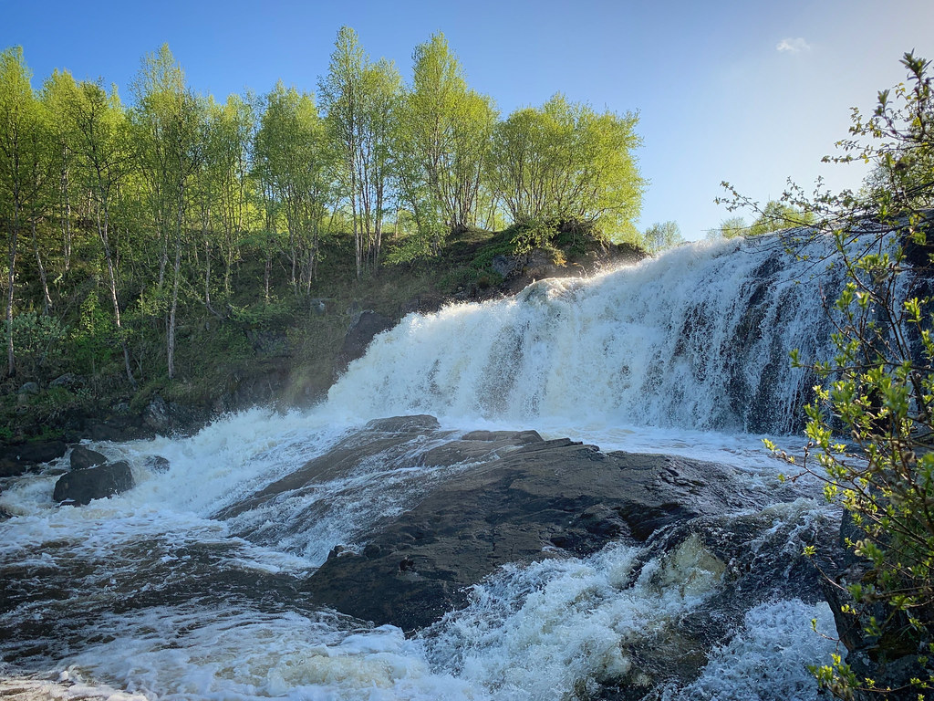 : Waterfall in the forest near Murmansk, Russia, June 2019