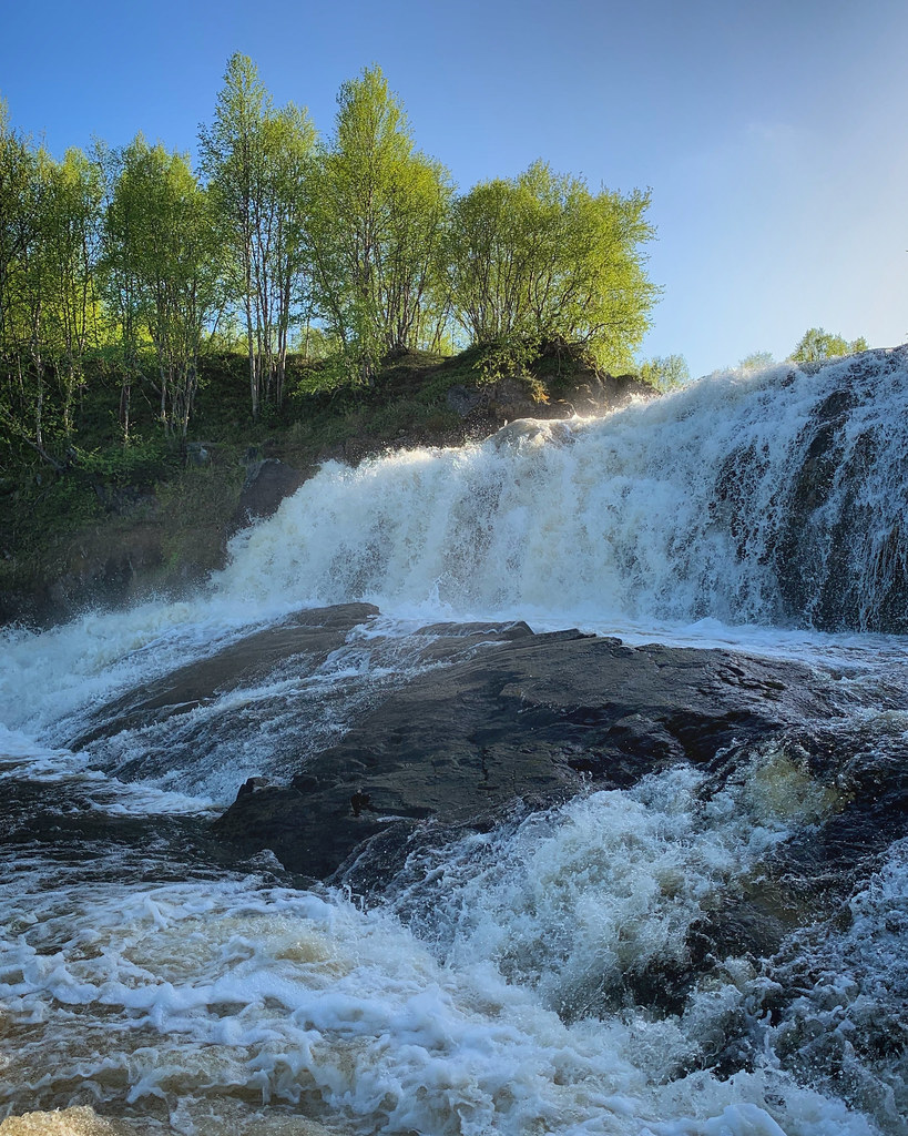 : Waterfall in the forest near Murmansk, Russia, June 2019