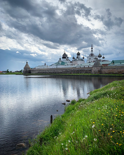 View of the Solovetski monastery reflected in Svyatoye lake, Solovki, Russia, June 2019 ©  sergei.gussev