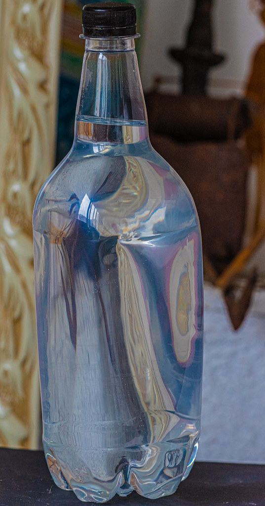 : Reflecting bottle with water