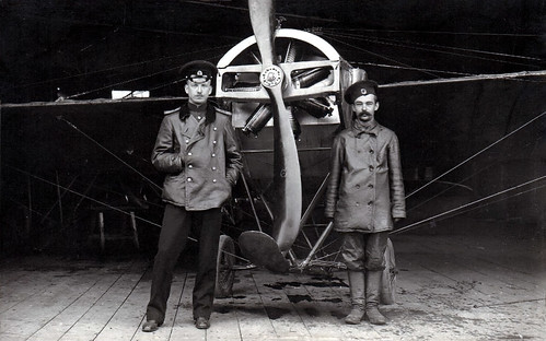 Staff-Captain P.N. Nesterov (left) with his aircraft mechanic and the Nieuport IV after the flight 11.05.1914 Kiev-Gatchina. ©  WWI Russian Imperial Army
