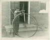 Photo of Henry Lungstrom with high-wheel bike