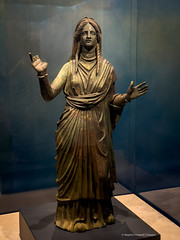 Etrusco-Roman bronze votive statue of a woman in the act of offering/praying (San Casciano bronzes)
