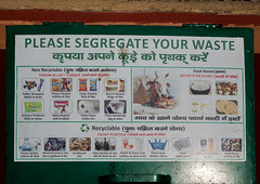 Ashram recycling campaign, seperates food that cows can eat, from plastic, diapers, etc., and non-recyclable,