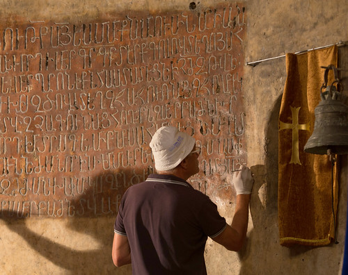 Restoration of Armenian script in chapel by Italians.