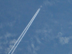 Jet And Contrails.