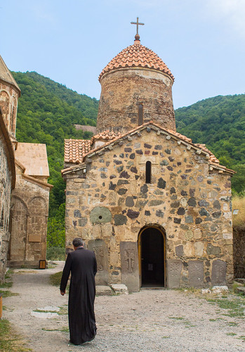 Armenian priest below 9th century Church of the Virgin