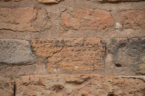 The Archaeological Castle of Susa, Mud-brick inscription of the Elamite period applied on the facade of the castle, Iran