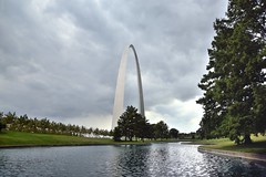 A Pond Lined with Trees and the Gateway Arch (Gateway Arch National Park)