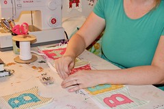 Rachel Murphy pins fabric pieces together at her home studio in Bogart, Georgia on April 17, 2019. (Photo/Paige Watkins)