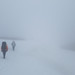 Cale Green and Michael Dickerson crossing Hikers Pass in clouds and 30-40mph winds. Adak Island, Alaska