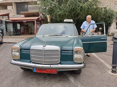 Old classical Mercedes and his owner, Harissa.