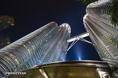 Skyscrapers of Kuala Lumpur, Malaysia. Petronas Twin Towers at night XOKA7354bs