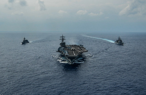 USS Chancellorsville and the JMSDF JS Fuyuzuki are underway in formation while conducting a bilatera