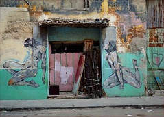Wall textures and additions. Murals in Havana.