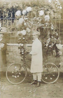 Man with decorated bicycle