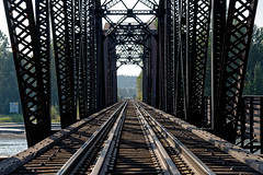 The Leading Line of a Railline Under a Bridge