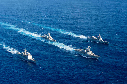 The guided-missile destroyer USS Mustin leads USS Antietam, USS Curtis Wilbur & JMSDF ship JS Fuyuzu