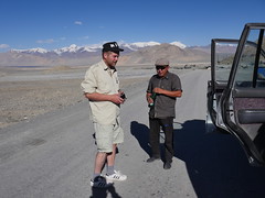 Our Kyrgys driver taking us the last bit of land into Osh from the Karakul