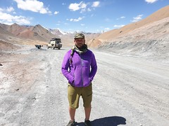 Standing on the Highest altitude on thw Pamir Highway.