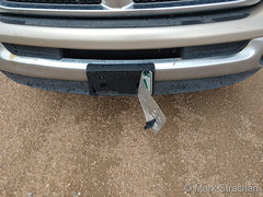 June 6, 2020 - Strong winds partially ripped a license plate off a truck.  (Mark Strachan)