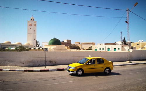 Tunisia, Houmt Souk - Taxi driving past a mosque - April 2010